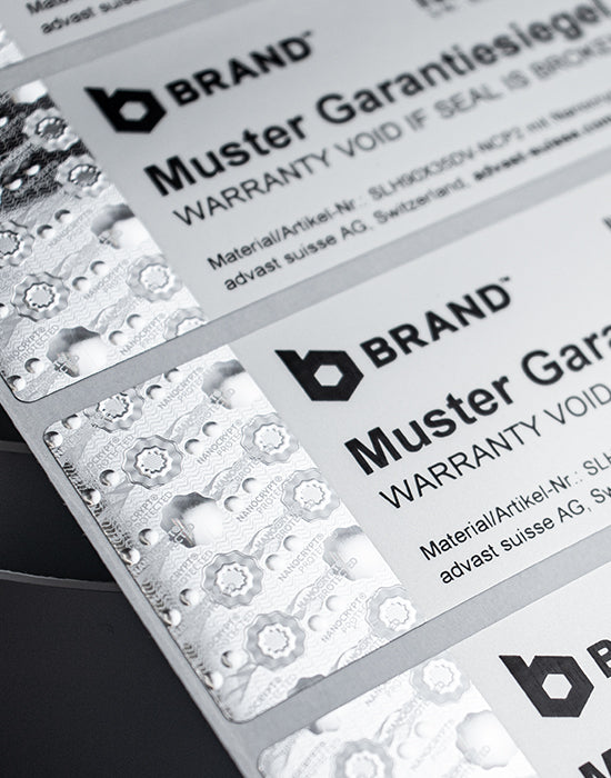 Security Seal “VOID” 90x35mm, silver/matt-grey, with Nanocrypt® Hologram